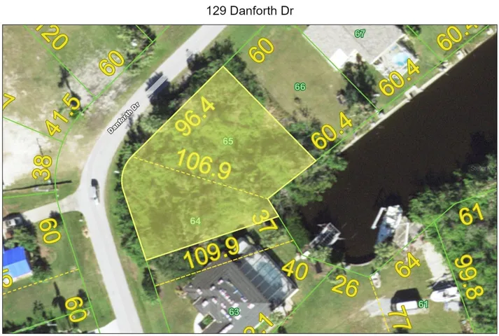 Oversized Canal Front lot approx 11,877 SF