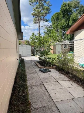 Side Entrance Fully Fenced in