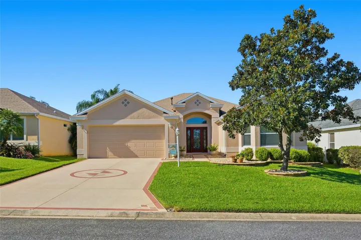 Front of the Lantana Designer Home with a Painted Driveway