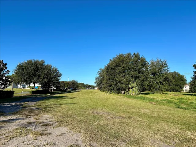 View from 1st Avenue looking west with hospital on the left and apartment complex on the right