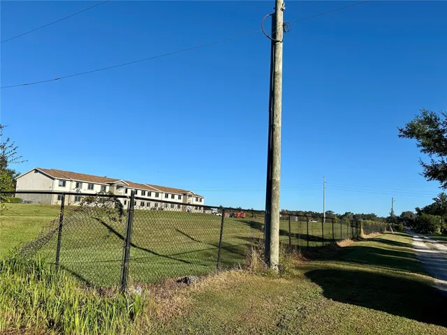 View from 1st Avenue looking north toward adjacent apartment complex