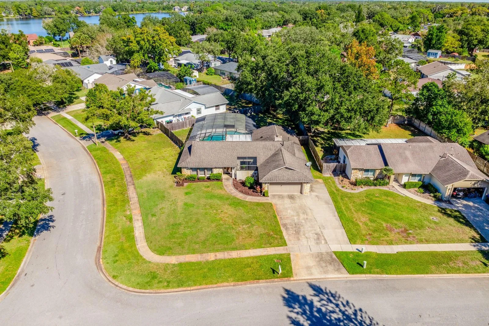 SCREENED POOL &amp; SPA ** LARGE CORNER LOT ** FENCED YARD ** GENERATOR ** SPLIT BEDROOM FLOOR PLAN ** TONS OF UPDATES ** WELCOME HOME!