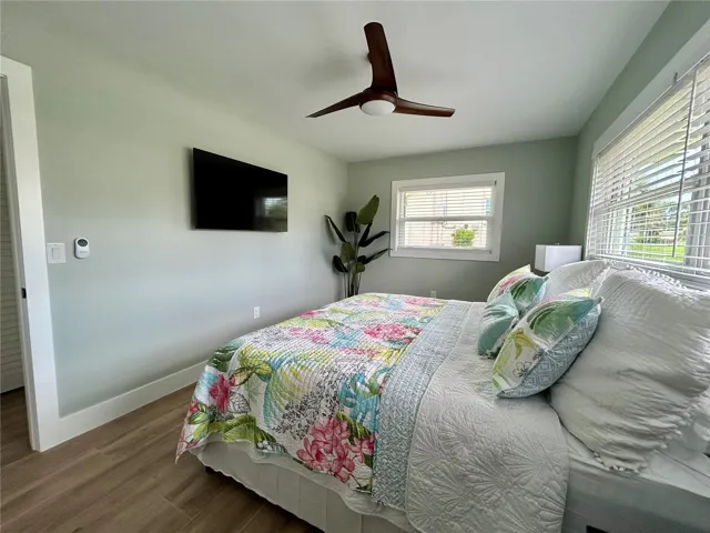larger bedroom with King size bed