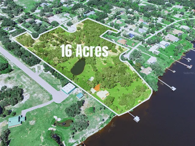 Aerial view of home and property
