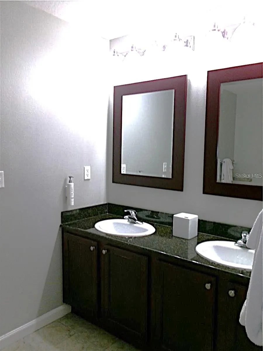 Dual sinks in primary bathroom