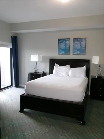 One bedroom has sliding door access to the balcony