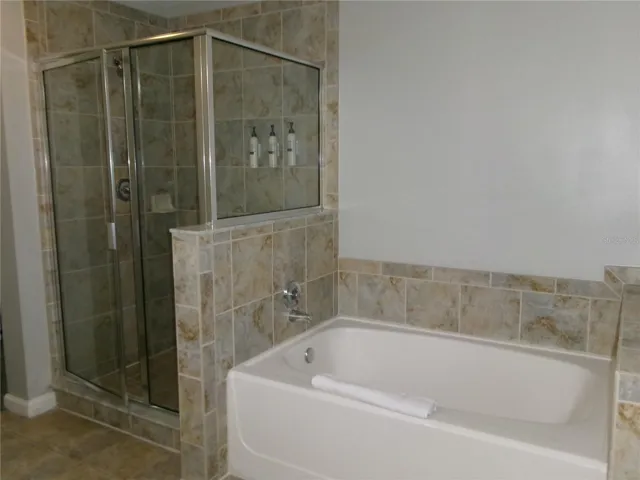 Gorgeous garden bath. Separate shower and soaking tub