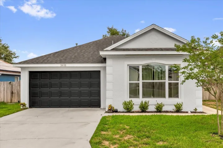 Welcome to 3622 Huntwicke Blvd—showcasing bold curb appeal in a gated community.
