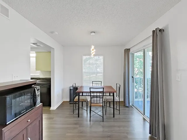 Your dining area with your Lanai to the right and Kitchen to the left!