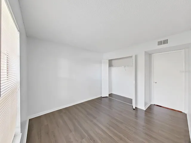 Bedroom 2 with a reach-in, standard closet!