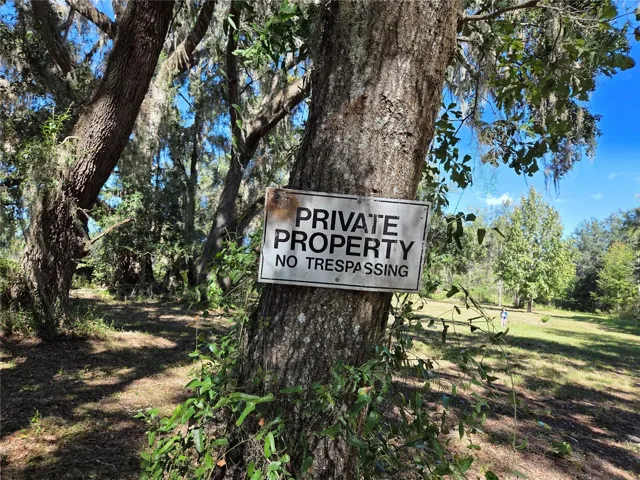 Front entrance off dirt roadway