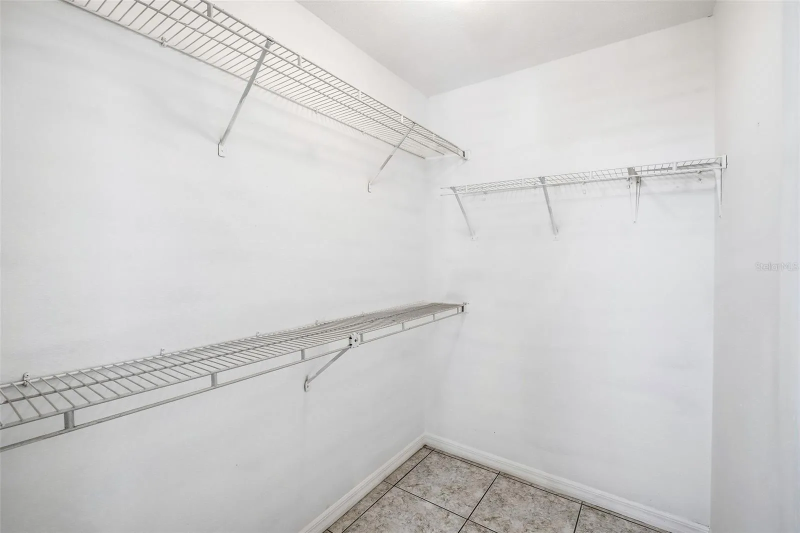 Primary Bedroom #1 Walk-in Closet