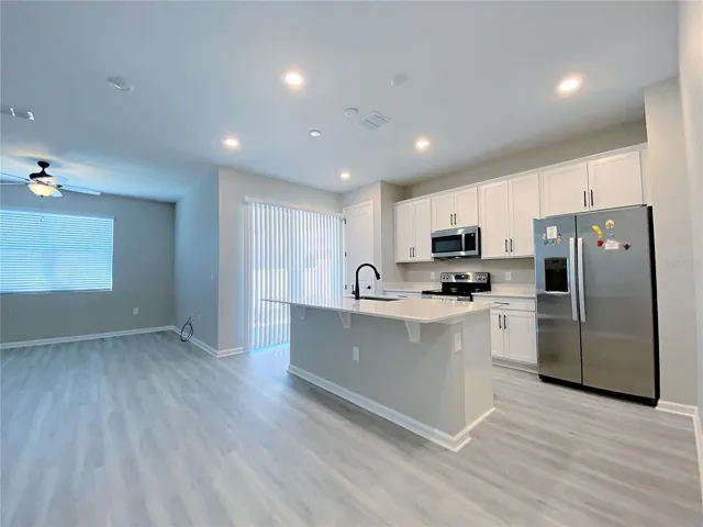 Kitchen flows into the great room/living room