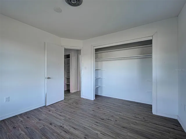 FRONT BEDROOM #2 WITH BUILT IN CLOSET