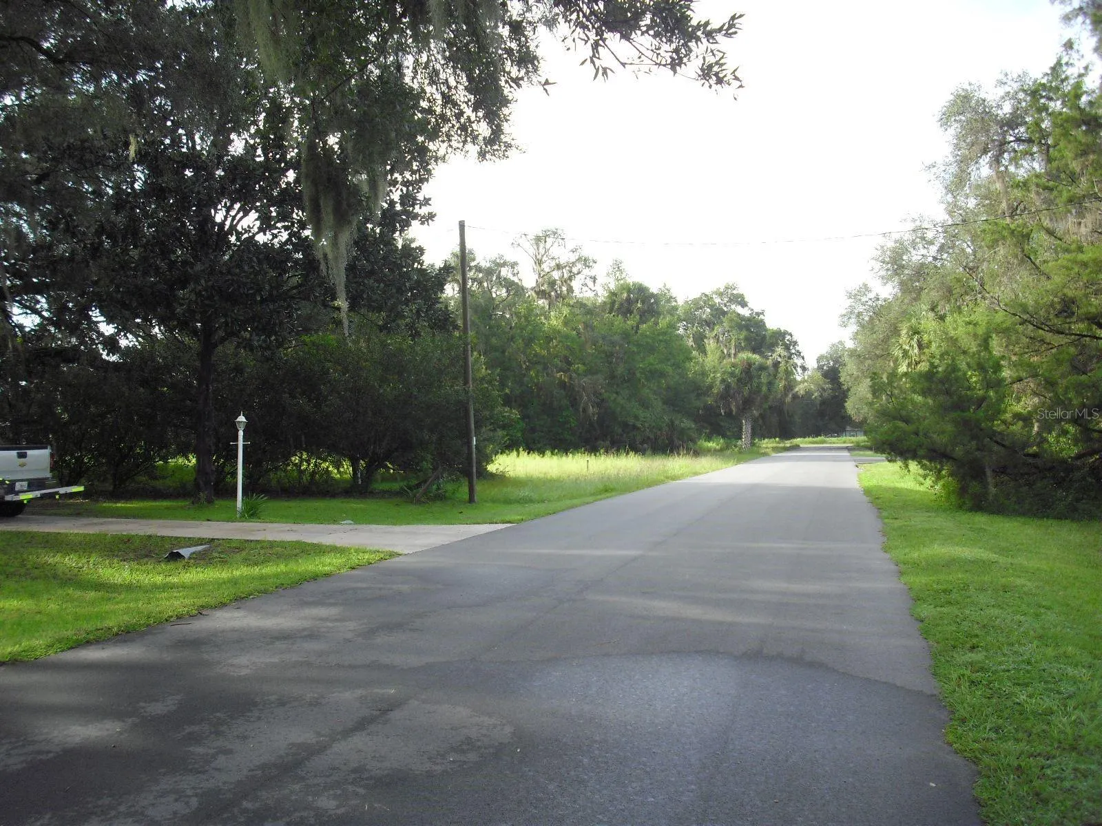 Heading South on SW 175th Ct_Lot on the left after Power Pole