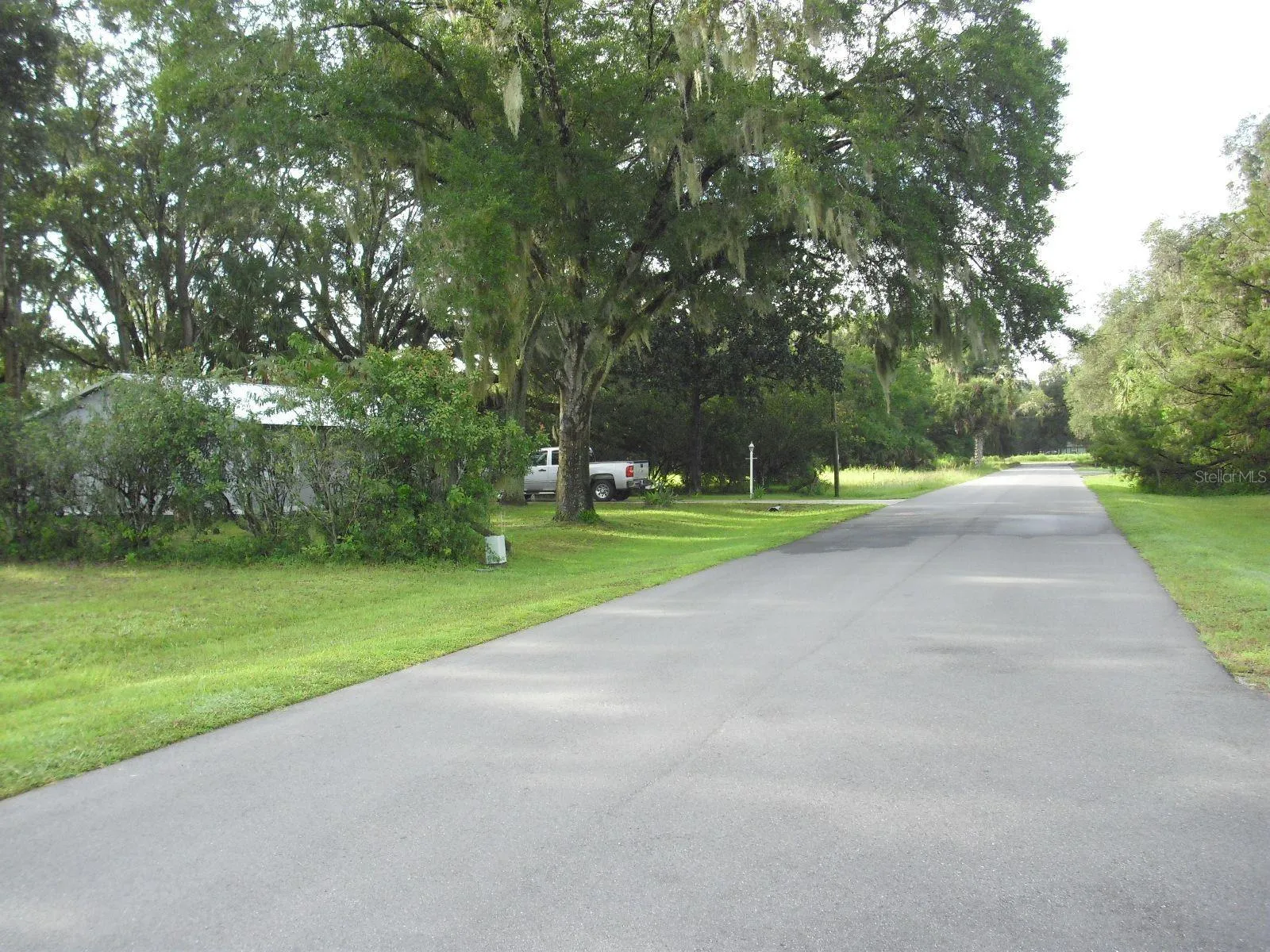 Heading South on SW 175th Ct_Lot on left after Home