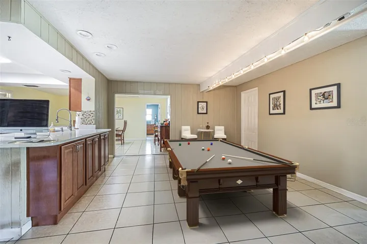 Virtually Staged to show space adjacent to the kitchen could be used as a bonus room.