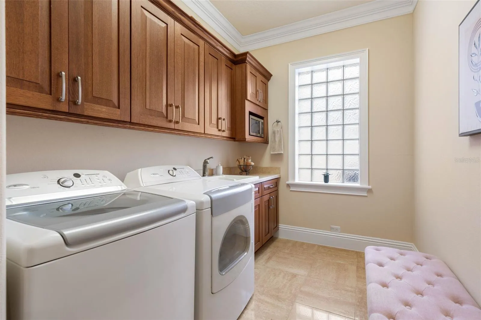 Laundry room with custom cabinetry