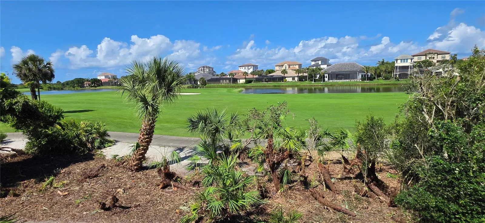 Picturesque views of golf course and lake from both floors