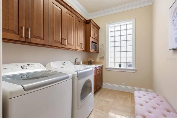 Laundry room with custom cabinetry