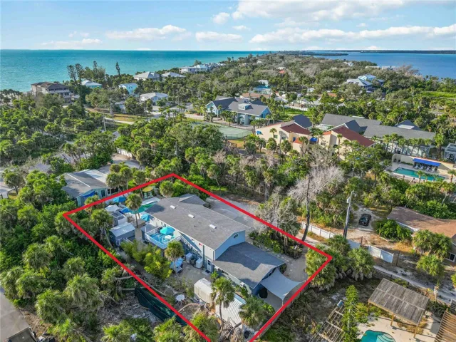 Over 1/2 acre on a private road on Manasota Key