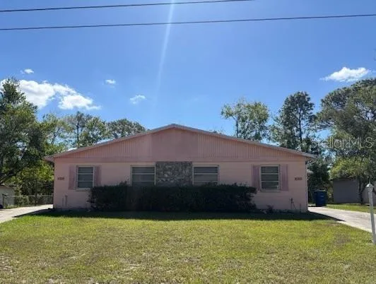 Charming Spring Hill Duplex!  2 units - Both are 2 bed / 1.5 Baths with large screened in Lanai & washer/dryer