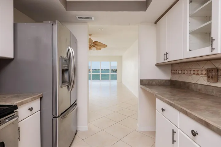 Kitchen w/Bay views though doorway.