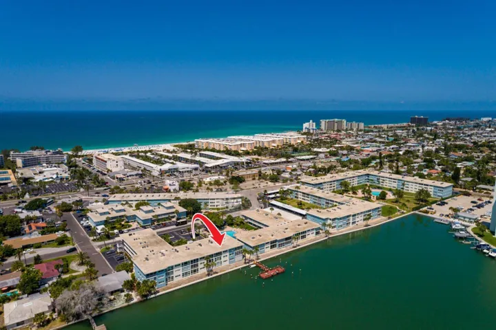 Walk to the Beach. Top floor waterfront unit on Boca Ciega Bay.