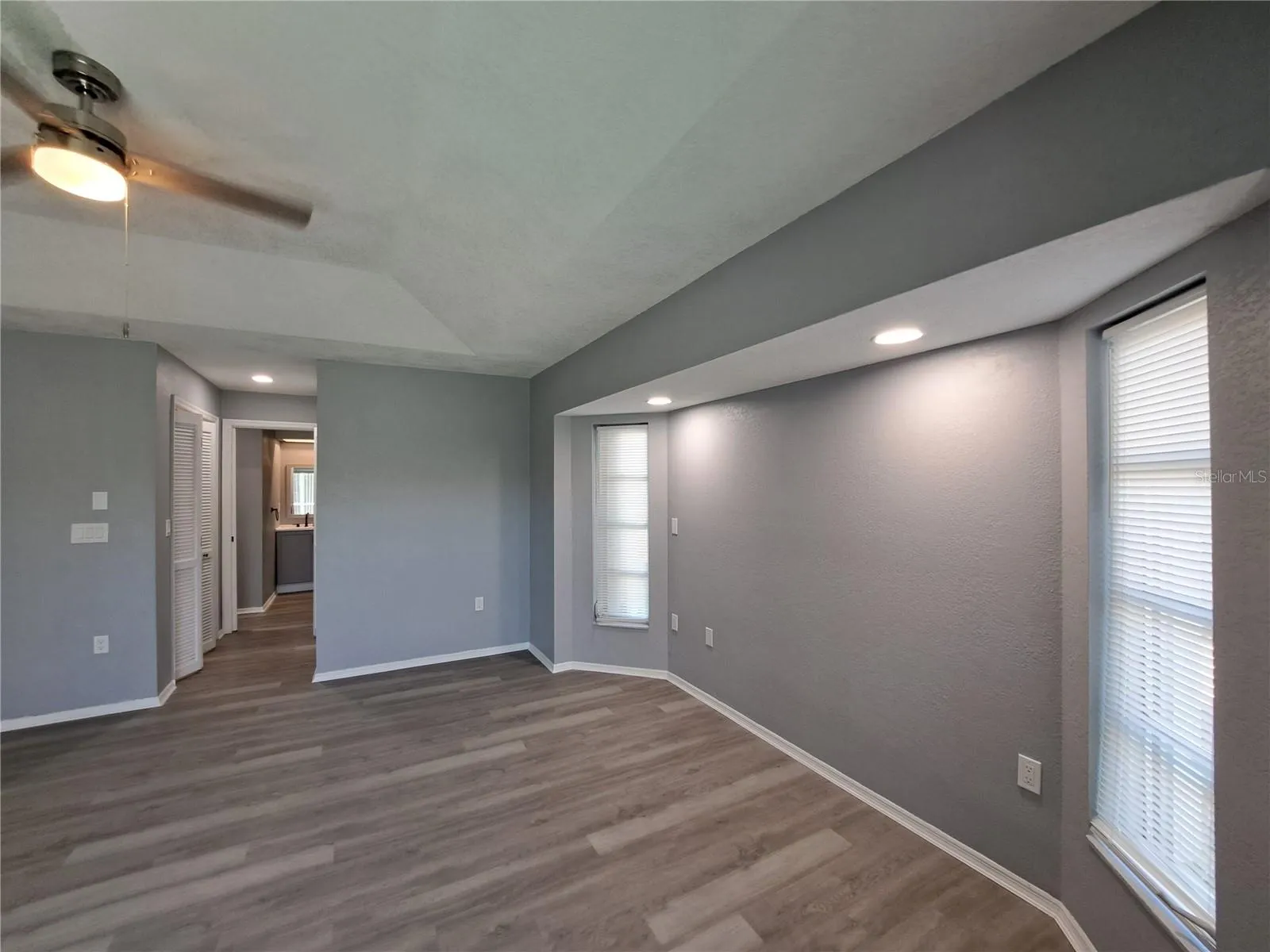 Master with hallway to bath and 2 walking closets