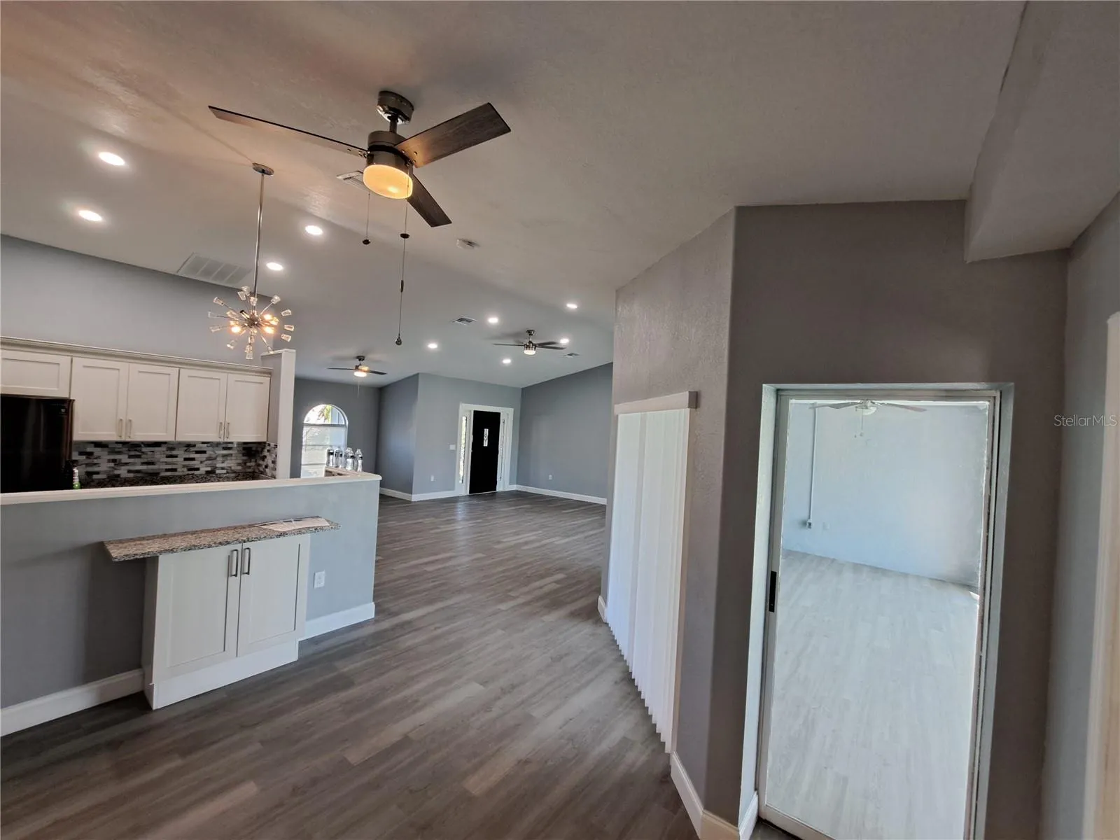 view to kitchen and LR from 2nd bedroom
