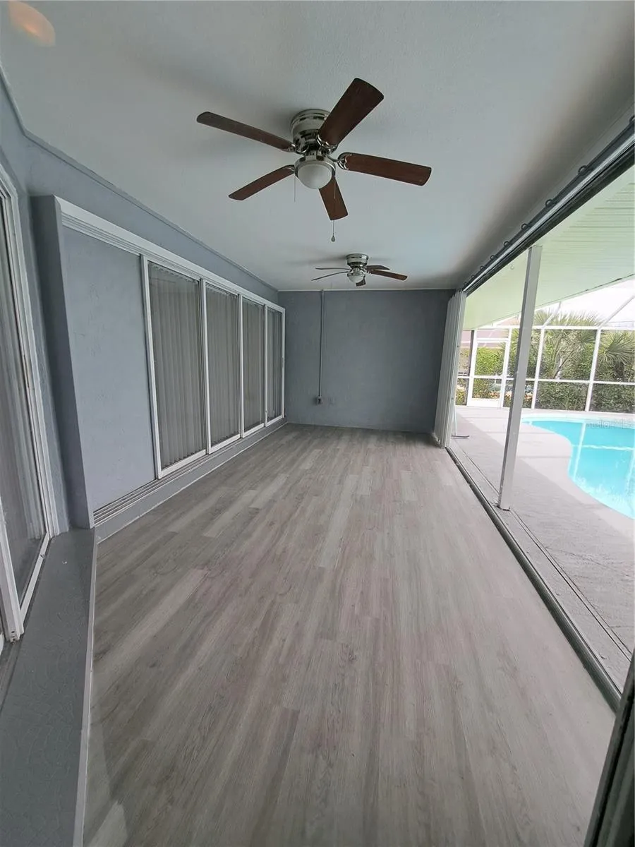 Pool lanai with hurricane shutters