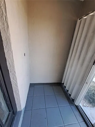 Screen front door porch with hurricane shutters