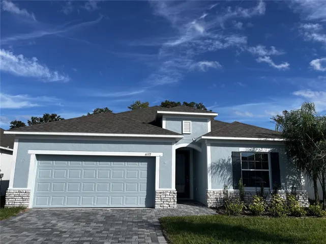 Move-in Ready! Stunning exterior- Block construction, brick entry & driveway pavers!