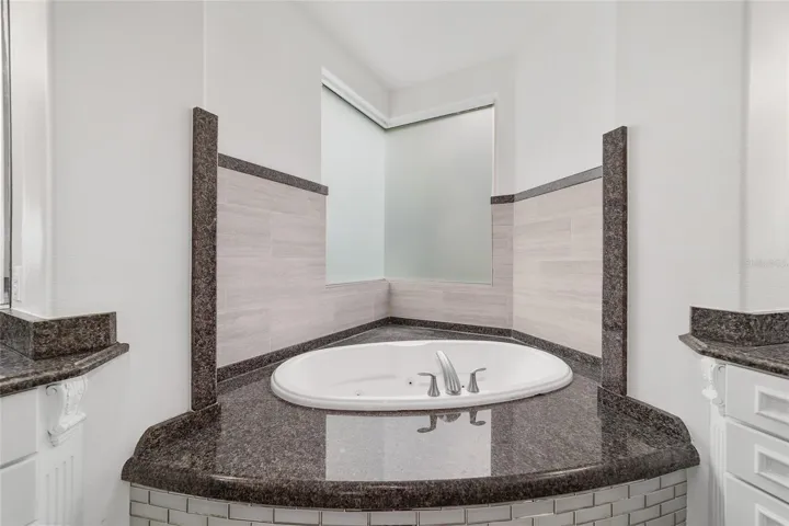 Main Level Primary Ensuite Jetted Tub