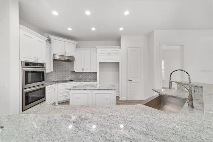 Gourmet Chef's Kitchen with Island Gourmet Chef's Kitchen with Stainless Steel Appliances