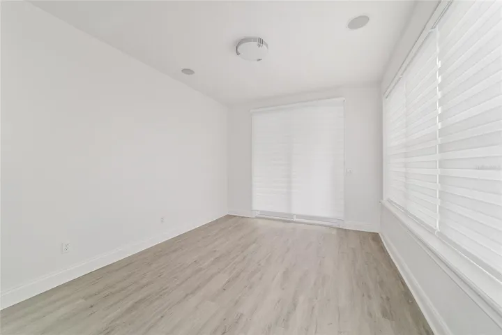 Upper Level Primary Bedroom with Balcony, Walk-In Closet and Ensuite Bathroom