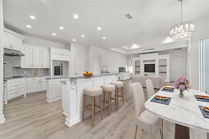 Virtually Staged Kitchen / Breakfast Room and open to Family Room