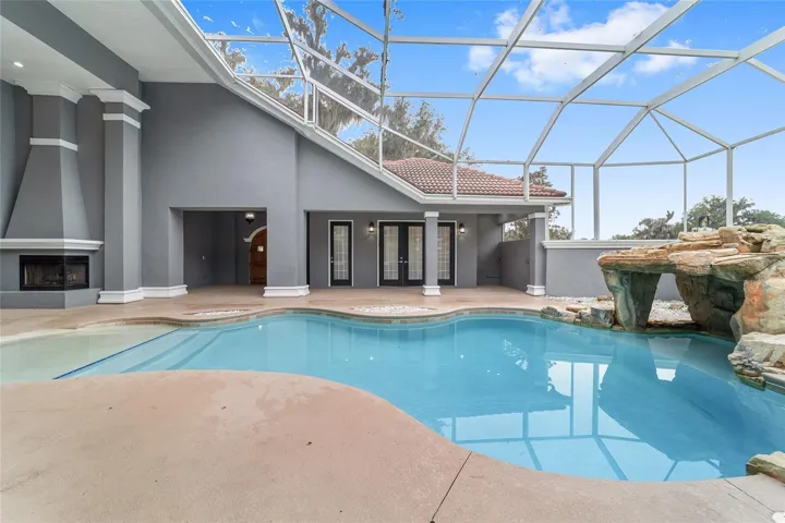 Swimming Pool with Screen Enclosure