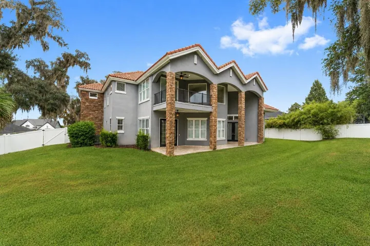 Exterior Rear View with Large Fenced Backyard