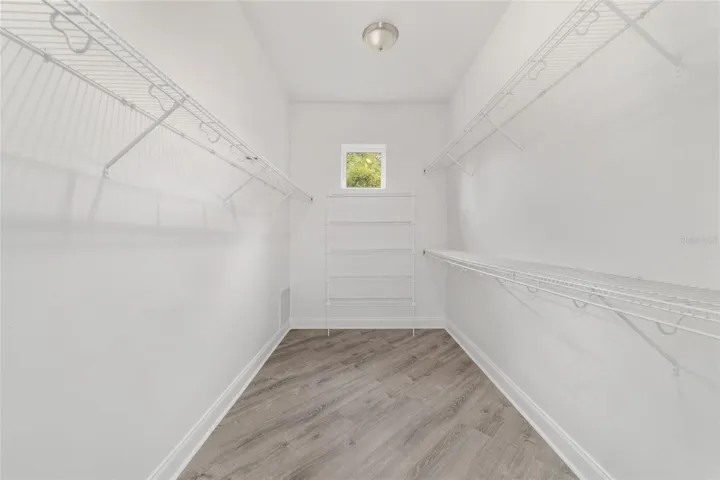 Main Level Primary Bedroom Walk-In Closet (2 of 2)