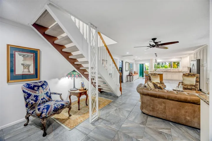 Sitting area under the stairs to the bonus room