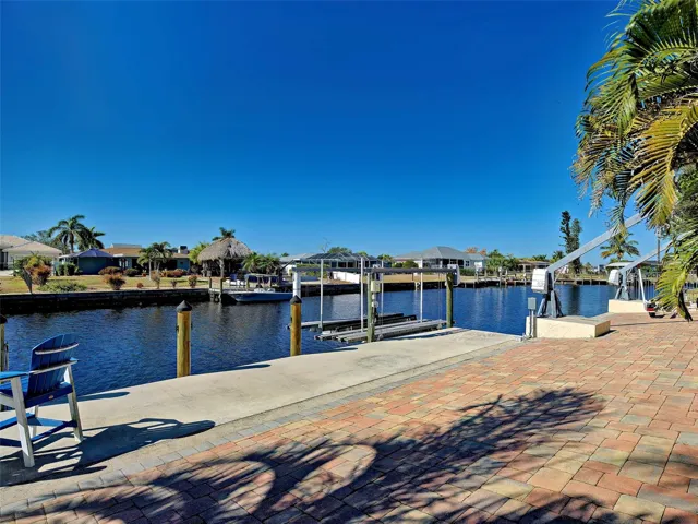 Boaters Paradise 10,000lb boat lift, 52 foot Concrete dock and twin davits all on deep water and no bridges to the Harbor and Gulf.