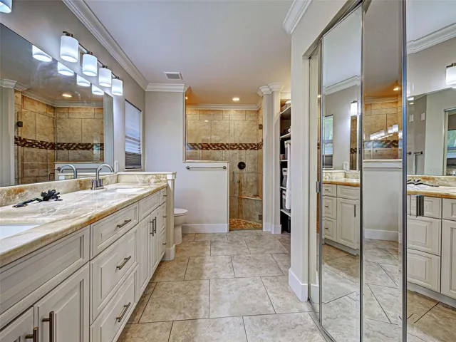 There are double sinks in the vanity in the primary bathroom as well as a walk-in closet.