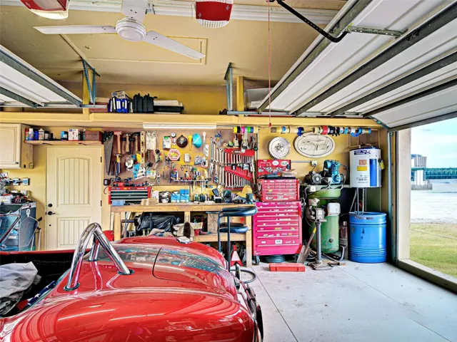 3 car garage also has a half bath