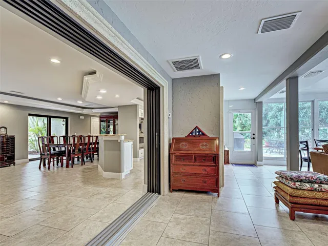 The lanai can be closed from the rest of the house with disappearing sliding glass doors.