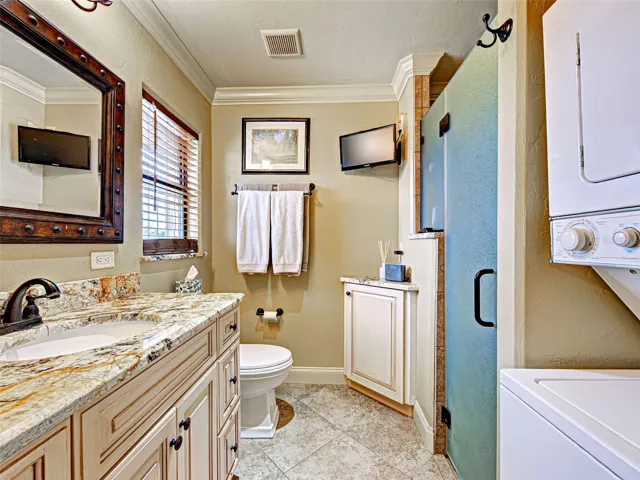 There is a washer and dryer in the cottage bathroom.