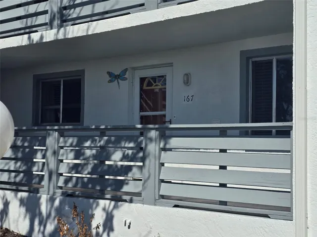 Front door with shaded porch