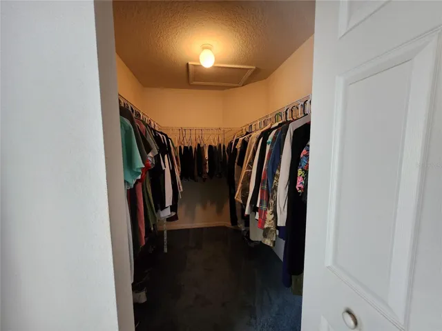 Walk-in Closet in primary bedroom