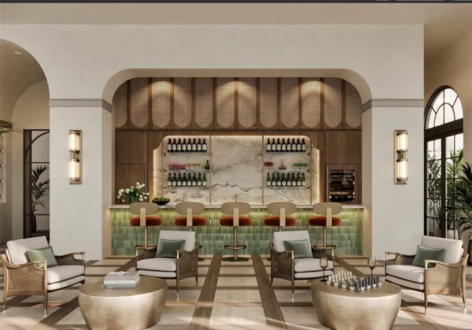 The Owner’s Lounge at Mira Mar features a beautifully designed gathering space with an elegant bar area, offering residents a sophisticated setting to relax, socialize, and entertain.