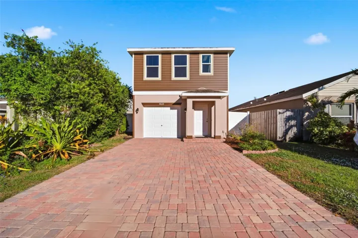 Front View, 2 Story, Impact Resistant Windows, Paver Driveway